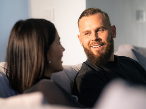 Couple Sharing a Moment in a Cozy Living Room Setting