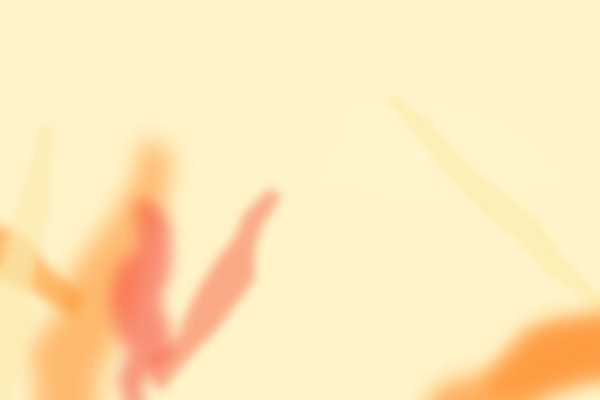 Abstract blurred background, with soft, flowing, shapes in shades, of orange, peach, and light yellow, creating a warm, and artistic atmosphere