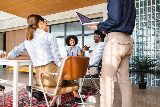 Meeting With Team Members in an Office Space During the Day