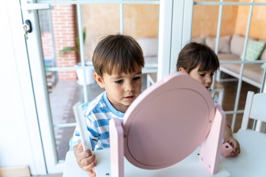 Children Playing With Toy Mirror