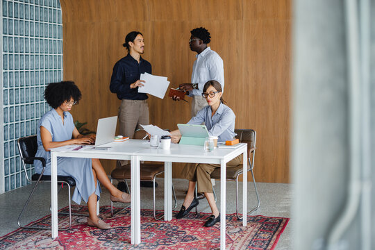 People Are Having a Discussion in an Office
