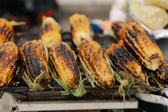 Roasted corn cob on grill