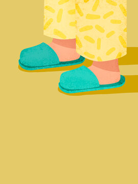 Person wearing pajamas and slippers walking at home