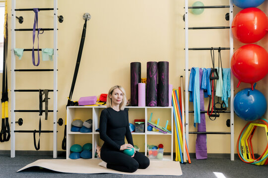 The blonde in the fitness studio.