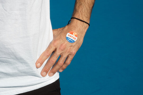I Voted Sticker on Man's Hand