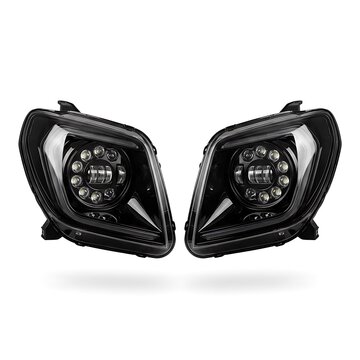 Pair of aftermarket led projector headlights for a vehicle isolated on white background
