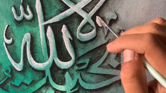 Time lapse of arabic calligraphy with brush and paint