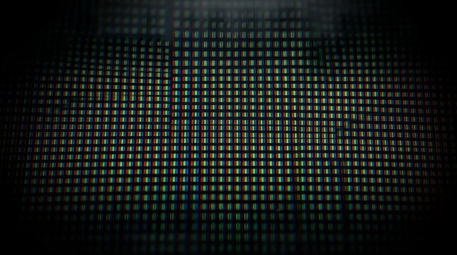 Macro view of digital computer screen pixels showing RGB subpixel grid technology