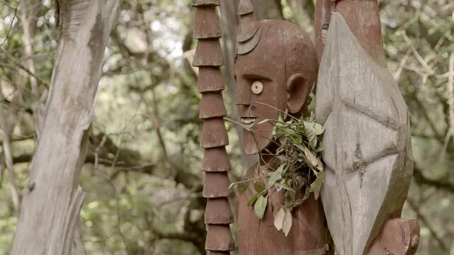 Idols set up in a forest in Ethiopia to mark the grave of a former chief in Konso.