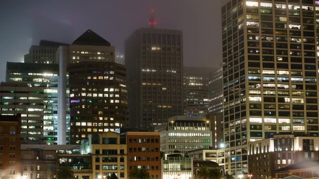San Francisco Downtown Skyscrapers from Pier 14 at Night Time Lapse California USA