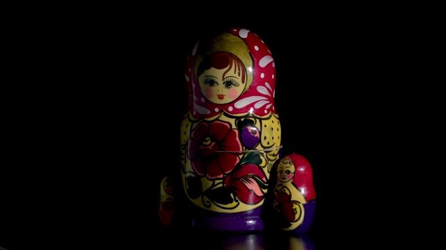 Conceptual close-up of a traditional spinning Matryoshka Russian nesting doll