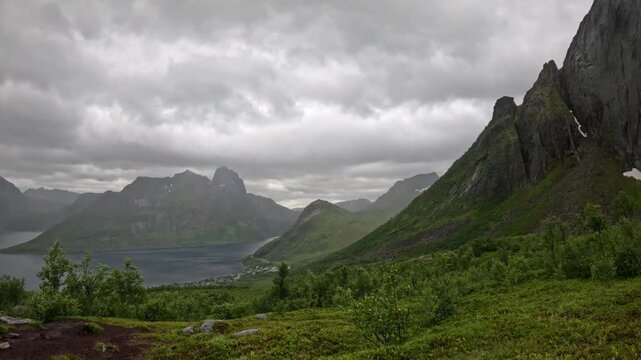 Ultra wide static view of iconic Segla mountain peak and fjord valley in Senja Norway