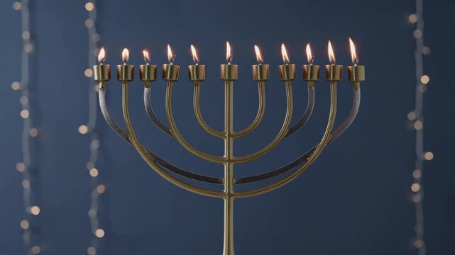 Hanukkah menorah with burning candles celebrating jewish holiday