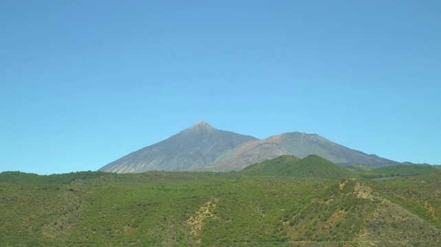 An exhilarating car journey across Tenerife Island with stunning views of the majestic Mount Teide in 4k slow motion 60fps
