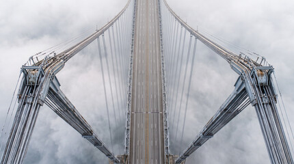 Fototapeta premium Overhead Symmetrical Suspension Bridge Roadway