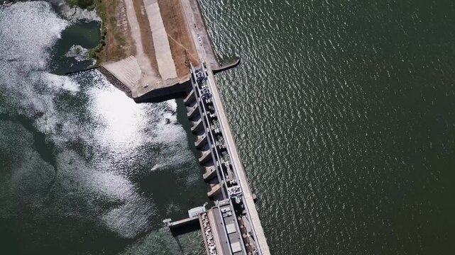 Drone Flight Along Hydroelectric Dam and Spillway