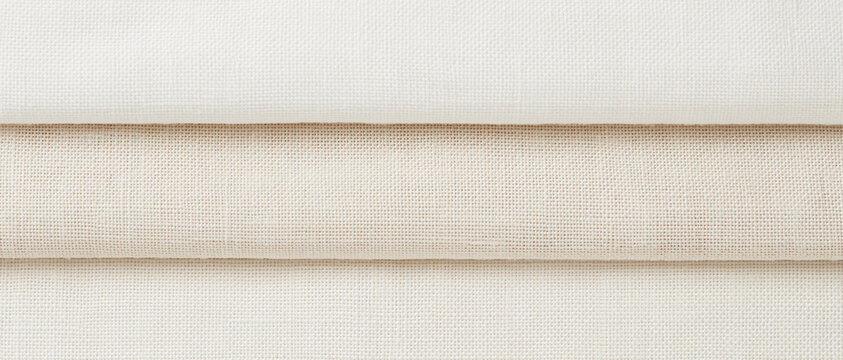 Minimalist linen fabric texture in ivory and off-white, soft neutral canvas backdrop with copy space