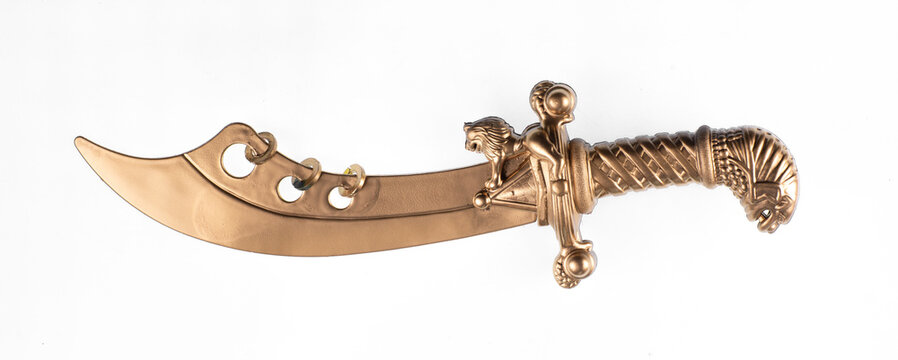 Golden pirate sword isolated on white background