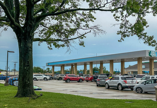 People waiting in line for fuel at a Family Express gas station after Northwest Indiana was devastated by tornados and straight line winds. Valparaiso, IN USA August 11, 2026