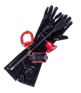 Latex black fetish gloves and accessories isolated on white background