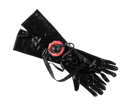 Latex black fetish gloves and accessories isolated on white background