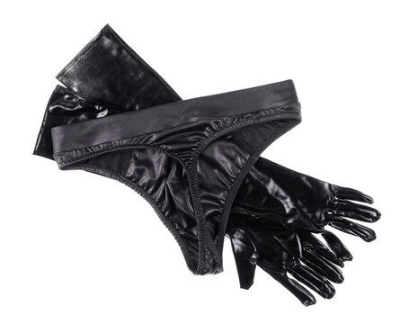 Latex black fetish gloves and accessories isolated on white background