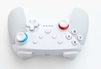 White video game controller isolated on white background © YouraPechkin