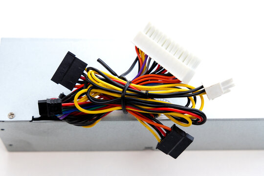 Computer power supply unit with colorful tangled cables