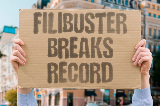 "Filibuster Breaks Record" A filibuster breaks the record for the longest speech in history. FILIBUSTER. BREAKS. RECORD. SPEECH. HISTORY.