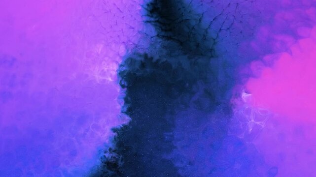 Mixing different colors of alcohol ink to create unique designs
