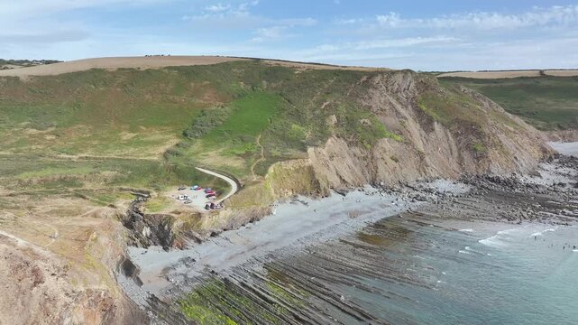 Cliffs and Fields over Welcombe Mouth Beach from a drone, North Devon and Cornwall Coastpath Border, Devon, England, Summer 2026
