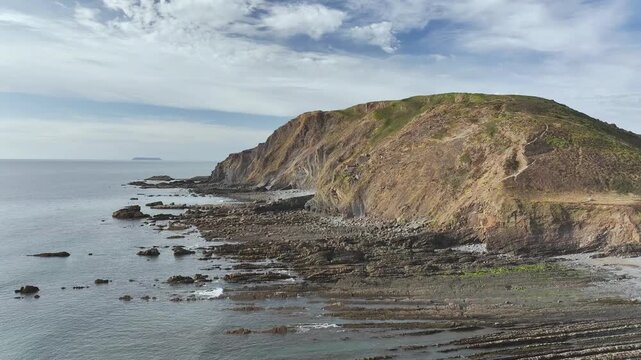 Cliffs and Fields over Welcombe Mouth Beach from a drone, North Devon and Cornwall Coastpath Border, Devon, England, Summer 2026