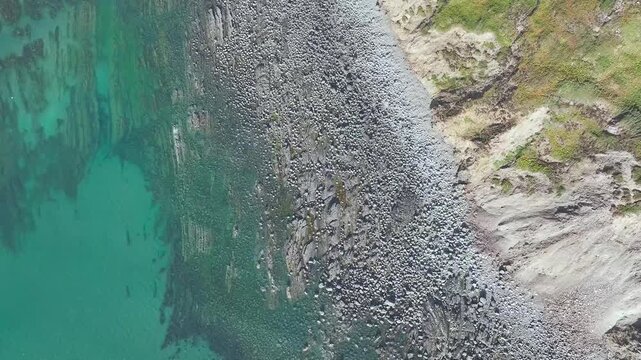 Top Down view of Cliffs and Farms over North Devon and Cornwall Coastpath Border from a drone, Welcombe Mouth Beach, Devon, Cornwall, England, Summer 2026