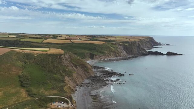 Cliffs and Fields over Welcombe Mouth Beach from a drone, North Devon and Cornwall Coastpath Border, Devon, England, Summer 2026
