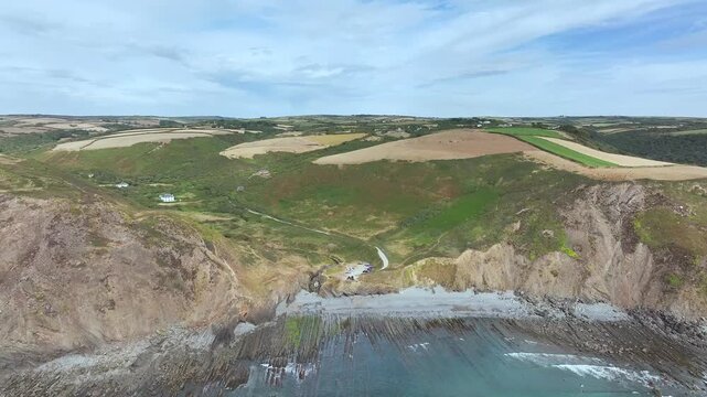 Cliffs and Fields over Welcombe Mouth Beach from a drone, North Devon and Cornwall Coastpath Border, Devon, England, Summer 2026
