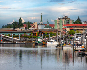 Naklejka premium View of the city center of Sitka from the harbor, with the iconic copper dome and bell tower of St. Michael's cathedral, Alaska, USA