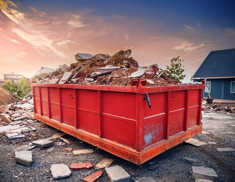 red construction dumpster with rubble renovation waste container background broken tiles debris detail demolition cleanup scene industrial disposal material building site trash view