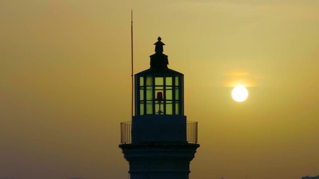  View of Chania with the amazing lighthouse, mosque, venetian shipyards, Crete, Greece.Waves crashing on lighthouse, Beautiful Greece and best scenic places - panorama