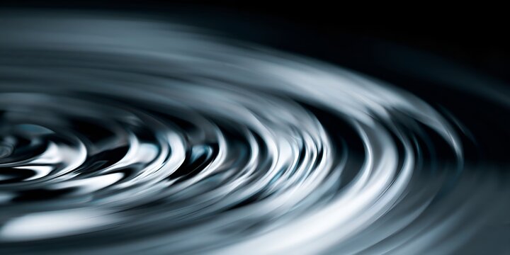 Monochrome water ripple pattern with soft gradients and motion blur