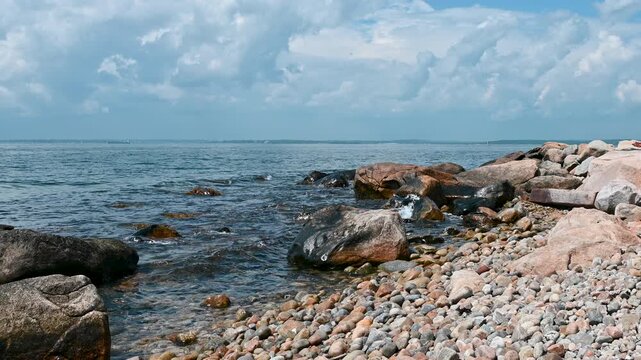 Fishers Island, New York, USA - Rocky New England Coastline beneath Dramatic Summer Clouds