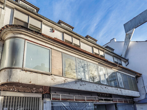 Old building facade showing closed down retail shop