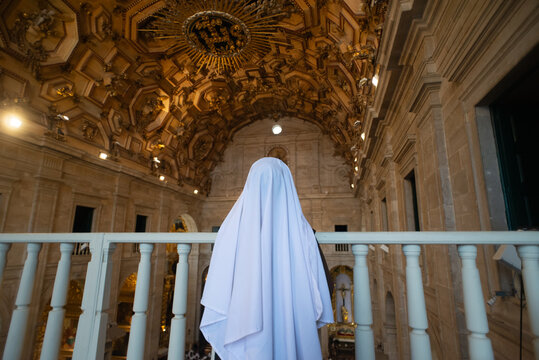 Nuns veil beneath the ceiling of the Cathedral Basilica of Salvador