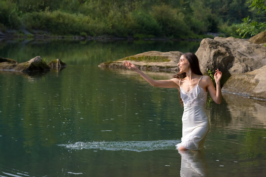 A Lovely Model Poses Outdoor While Enjoying The Summer Weather