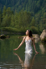 Fototapeta premium A Lovely Model Poses Outdoor While Enjoying The Summer Weather