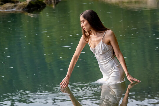 A Lovely Model Poses Outdoor While Enjoying The Summer Weather