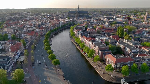 Aerial view on a Haarlem town, the former Capital of the Netherlands. Filming from the air with a drone at sunset Time