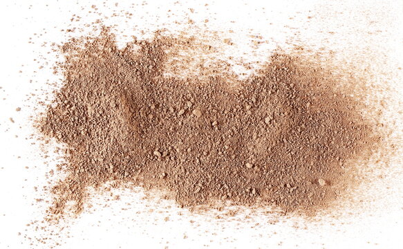Chocolate ground, pile powder scattered, isolated on white background, top view, clipping path