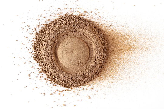 Chocolate ground, pile powder in shape circle, isolated on white background, top view
