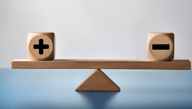 balanced wooden scale with plus and minus cubes