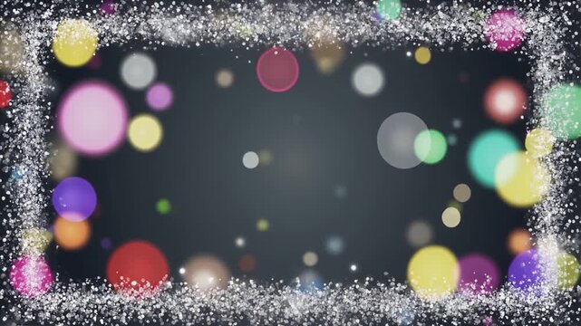 銀色の粒と多色の玉ボケが囲む背景　余白のある映像素材